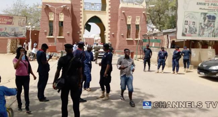 Police storm Kano emir’s palace, chase away local hunters guarding Sanusi